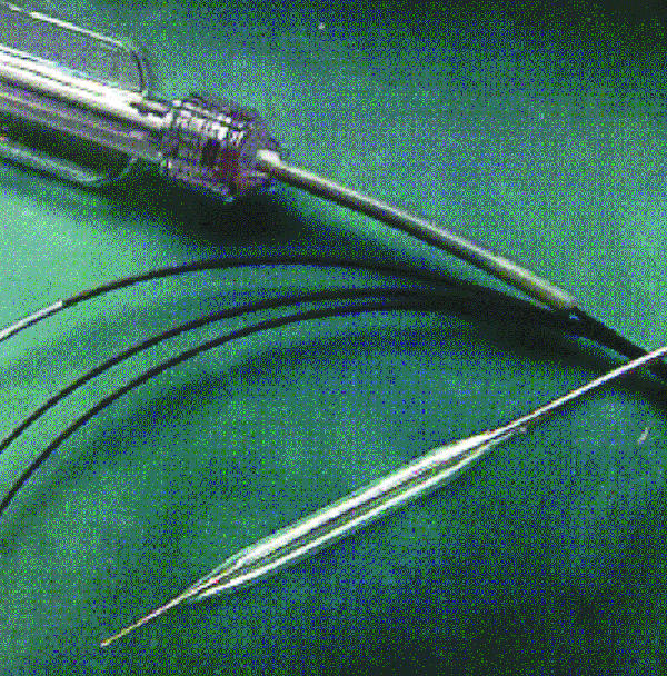 Modern balloon catheter construction showing shaft, balloon, guidewire lumen, and markers